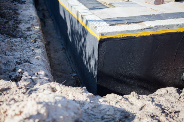 Professional Wet Basement Repair technician working in Marquette, MI